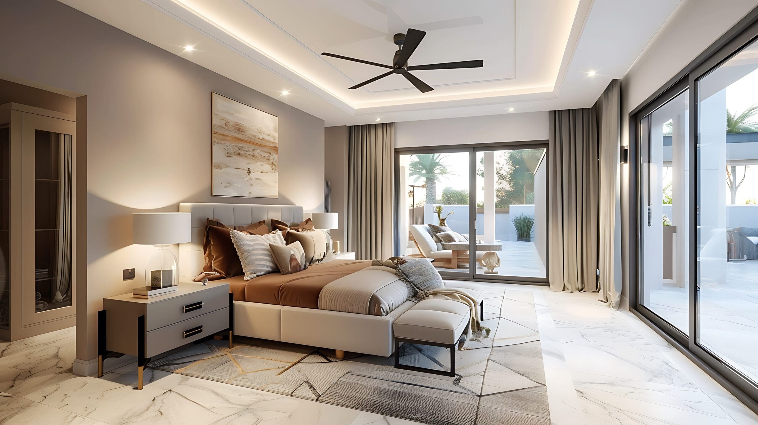 Luxurious bedroom with a modern design featuring a large bed, bedside tables with lamps, and a ceiling fan. The room has sliding glass doors leading to a spacious outdoor patio, with neutral decor and warm lighting.